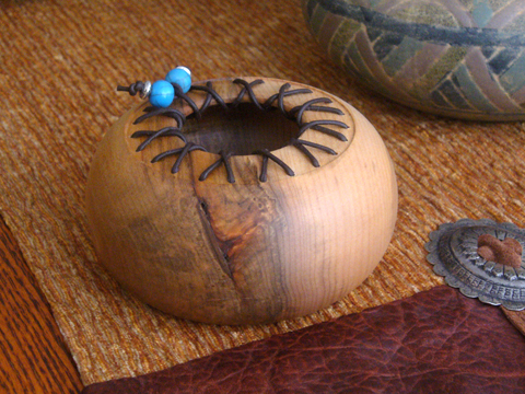 A Maple Bowl With Leather Accent