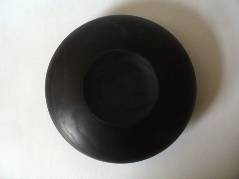 A Bowl Of Blackened Ash