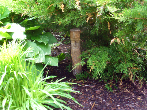 Grinning Garden Gods In The Green