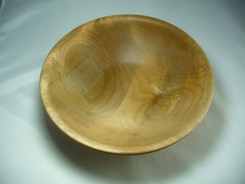 A Large Maple Bowl With Rings