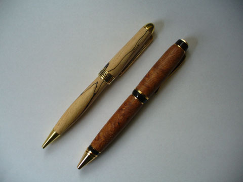 Turned Pens Of Birch And Amboyna